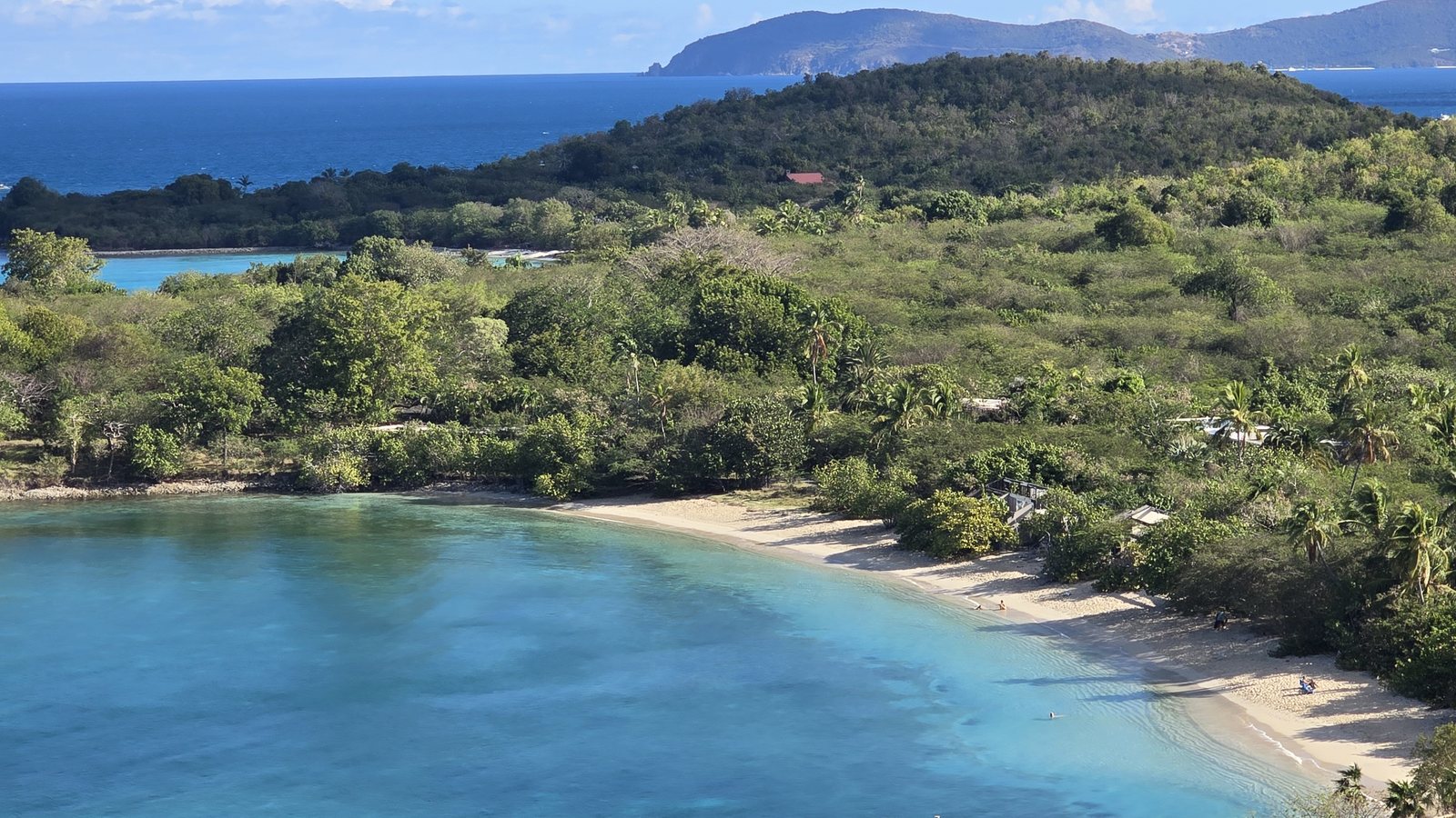 Caneel Bay with white sand spit from overlook
