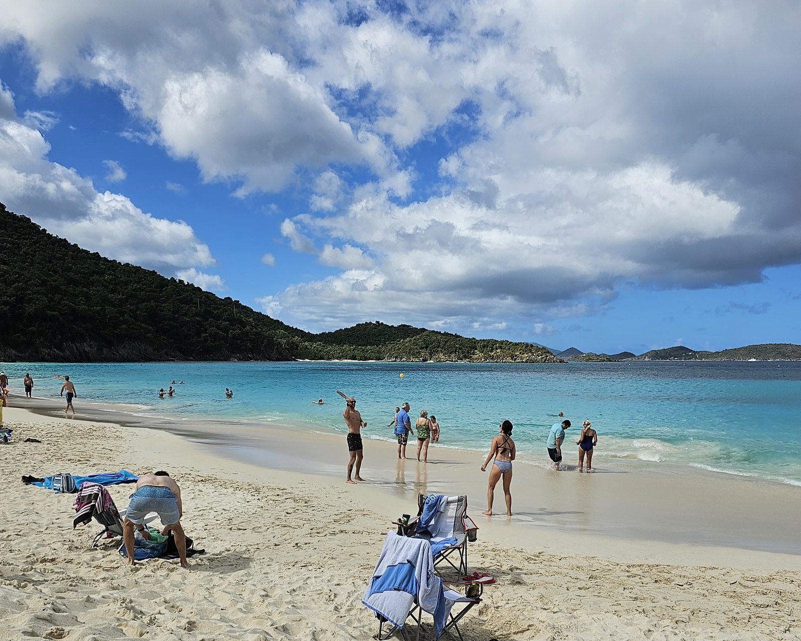 Cinnamon Bay long crescent beach with island view